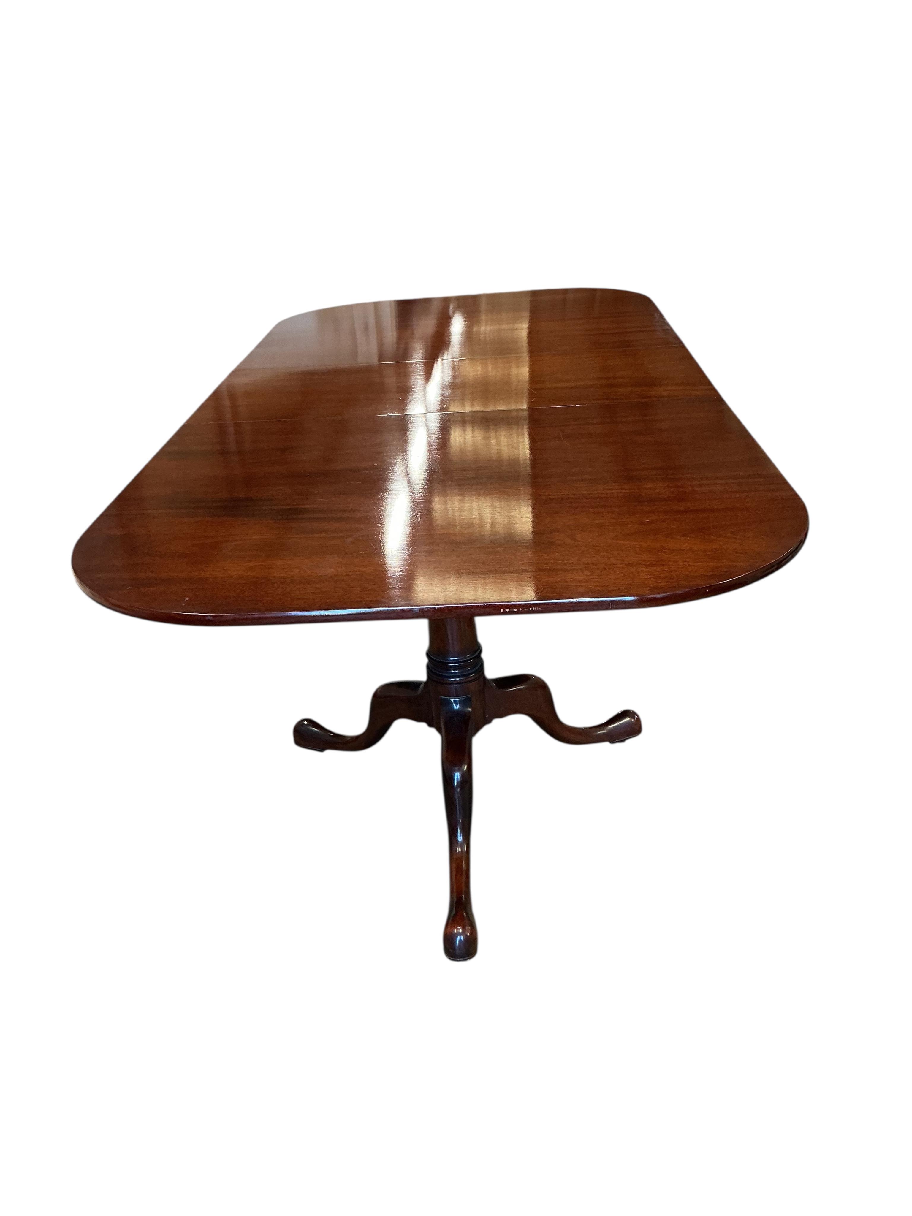 A William Tillman reproduction mahogany twin pillar extending dining table, 225cm extended, one spare leaf, depth 115cm, height 74cm